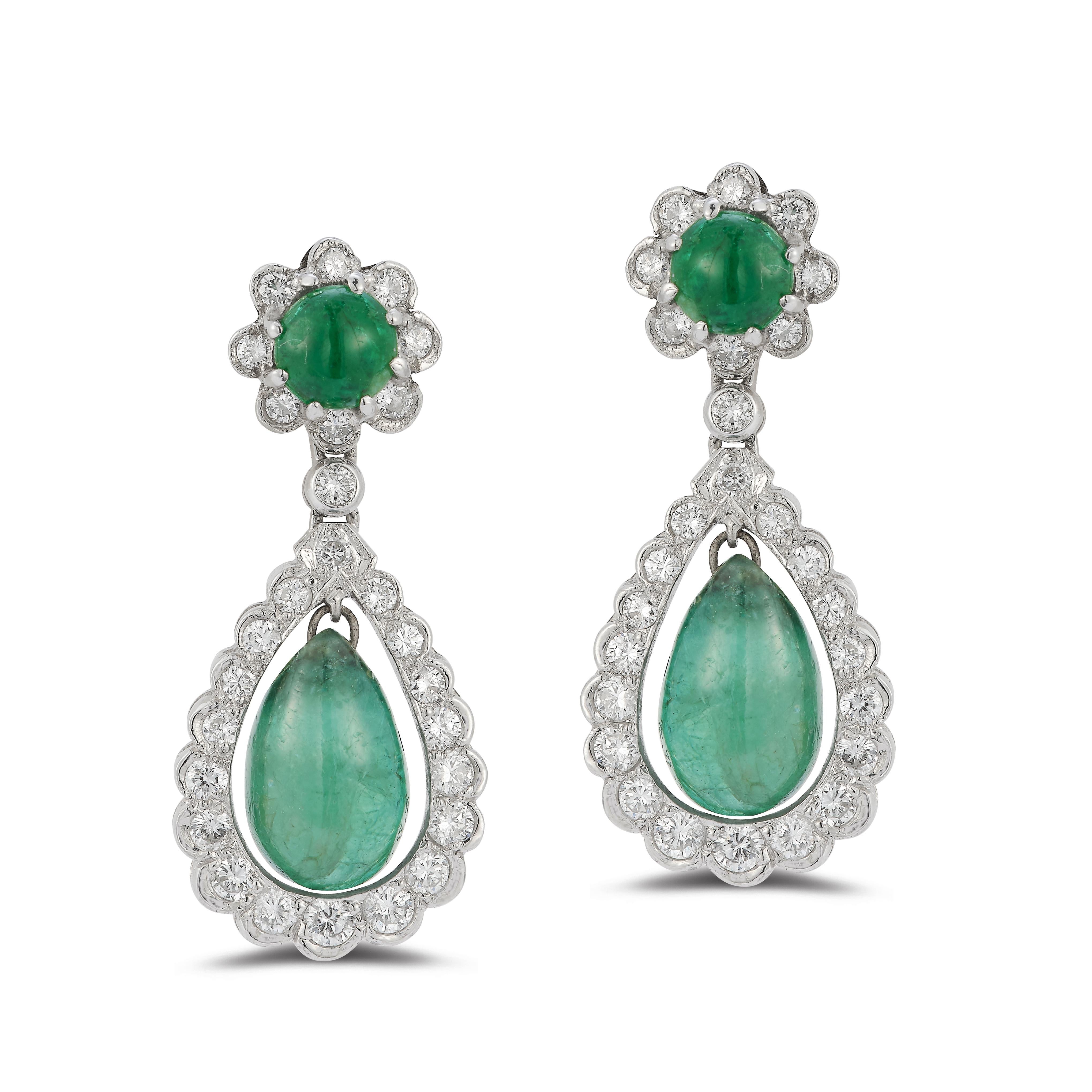 Cabochon Emerald and Diamond Earrings

14 karat white gold earrings with 2 emerald drops approximately 10 carat, 2 cabochon emeralds approximately 1.60 carat, 54 round diamonds approximately 1.74 carat 

Length:  1.25
