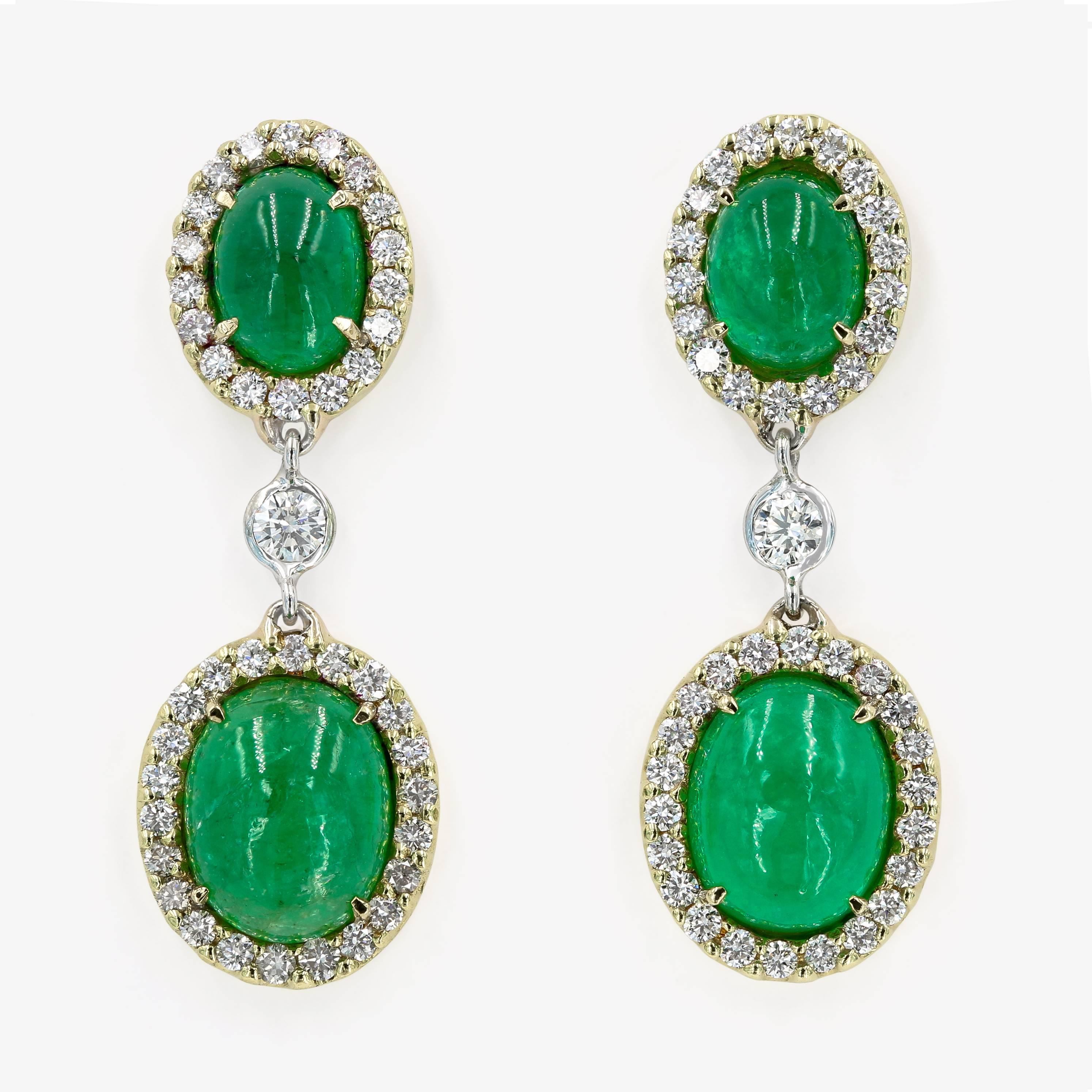 These custom crafted original earrings are set in 18kt. yellow gold with 4 oval shaped cabochon cut emeralds: 2 emerald cabochons=6.09cts. t.w. and 2 emerald cabochons=3.25cts. t.w. The emeralds are surrounded by 82 ideal cut round diamonds=1.36ct.