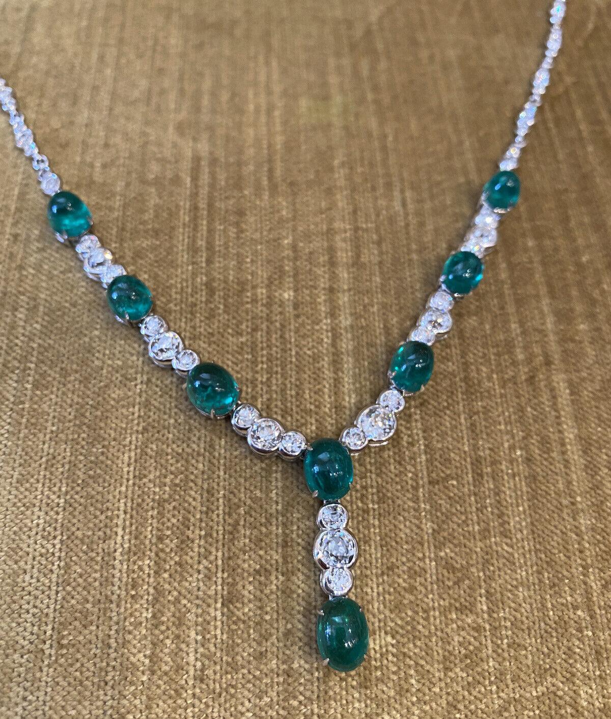Cabochon Emerald and Old Cut Diamond Y-Drop Necklace in 18k White Gold

Emerald and Diamond Necklace features 8 Deep Green Round and Oval shaped Cabochon Emeralds set with Round Old Cut and Round Brilliant Diamonds in 18k White Gold

Total weight of