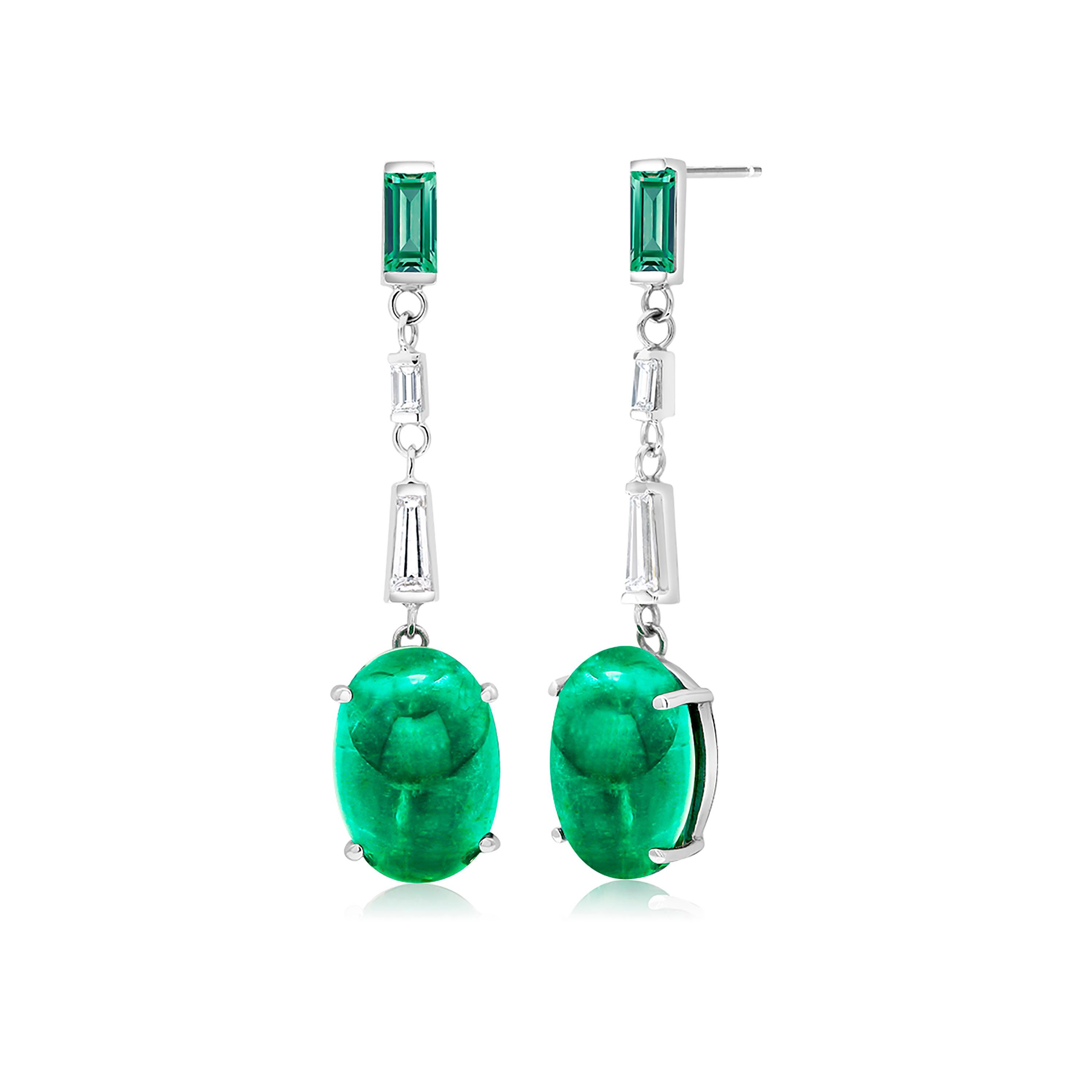 Fourteen karats white gold large cabochon emerald and baguette diamond and emerald drop earrings 
Two Taper Baguette Diamond weighing 0.90 carat
Two Cabochon emeralds weighing 13.00 carat 
Two Baguette diamond weighing 0.25 carat
Two Baguette