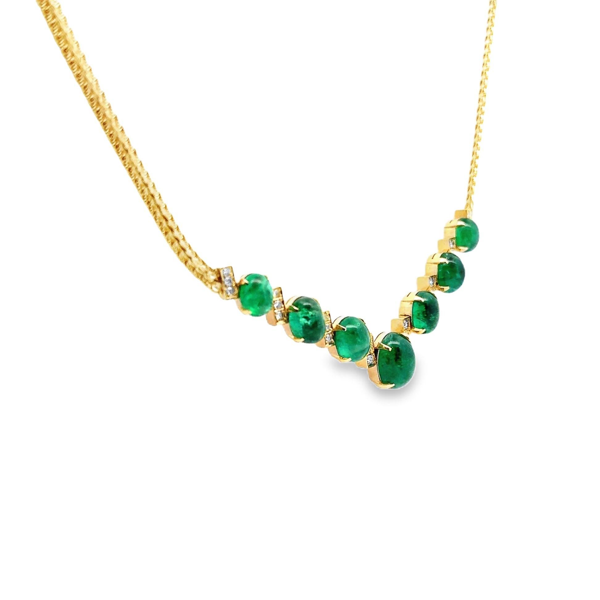 A chic and stylish necklace featuring 7 cabochon emeralds. The 7 emeralds weigh a total of 17.42 carats and have an intense rich green color. They graduate in size and are complemented by 0.46 carats of round brilliant-cut diamonds which add