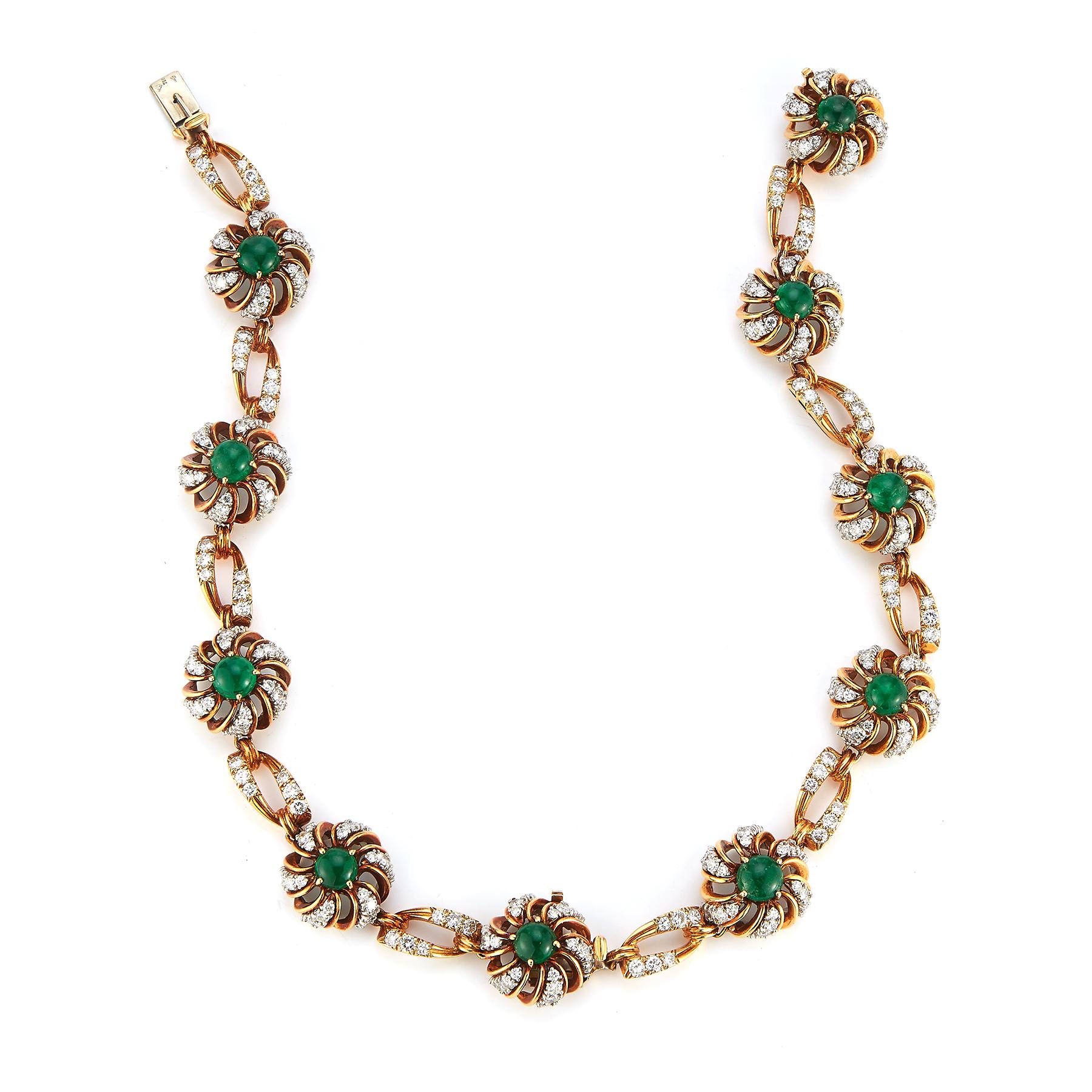 Cabochon Emerald & Diamond Flower Necklace

10 cabochon emeralds approximately 17.00 cts surrounded by round cut diamonds approximately 23.00 cts 
Convertible into two bracelets 

Measurements: 16