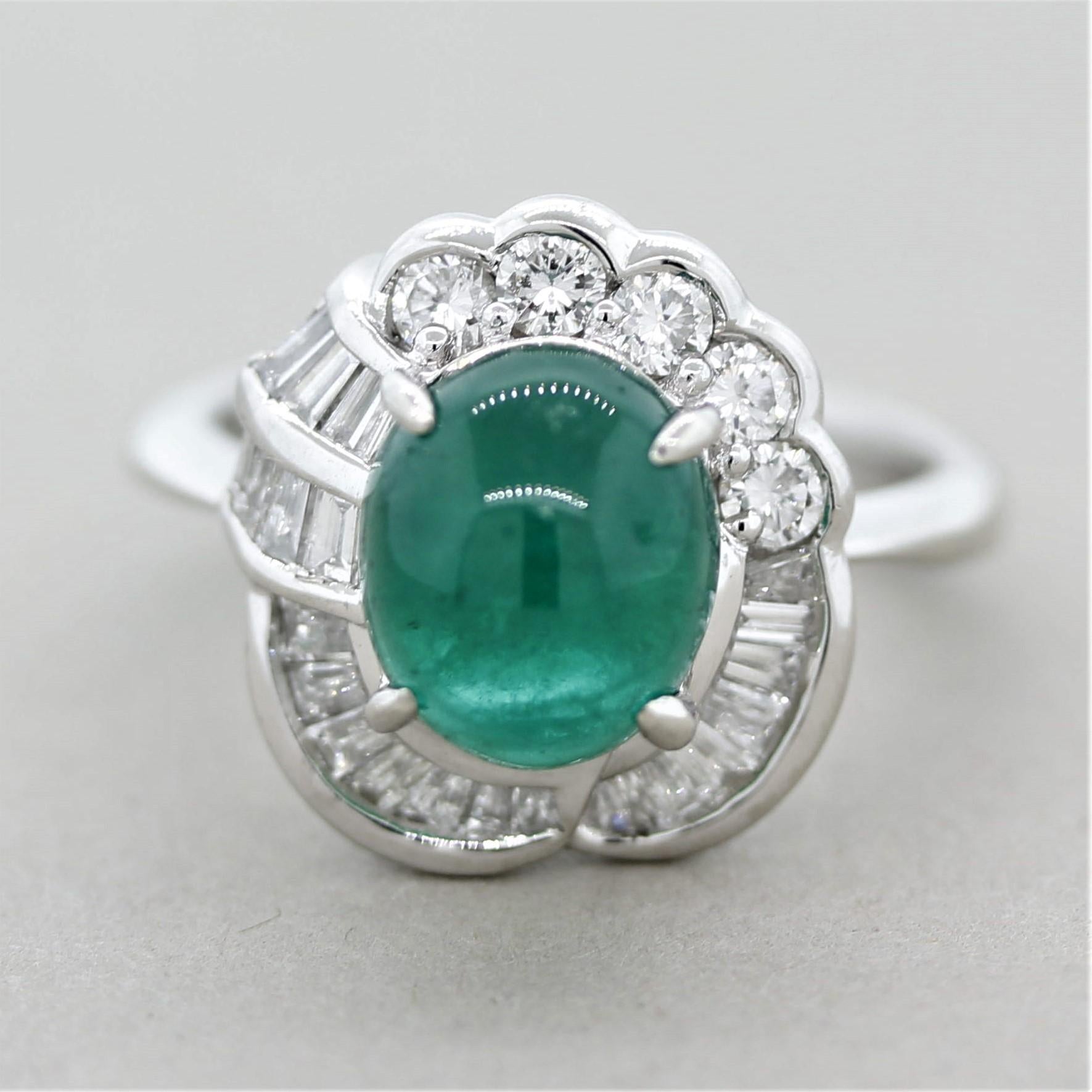 A beautifully made ring with a stunning emerald! The emerald weighs 3.25 carats and has an intense vivid green color. Adding to that, the cabochon-shape makes the stone appear to glow making it so pleasing to look at. The emerald is accented by 0.83