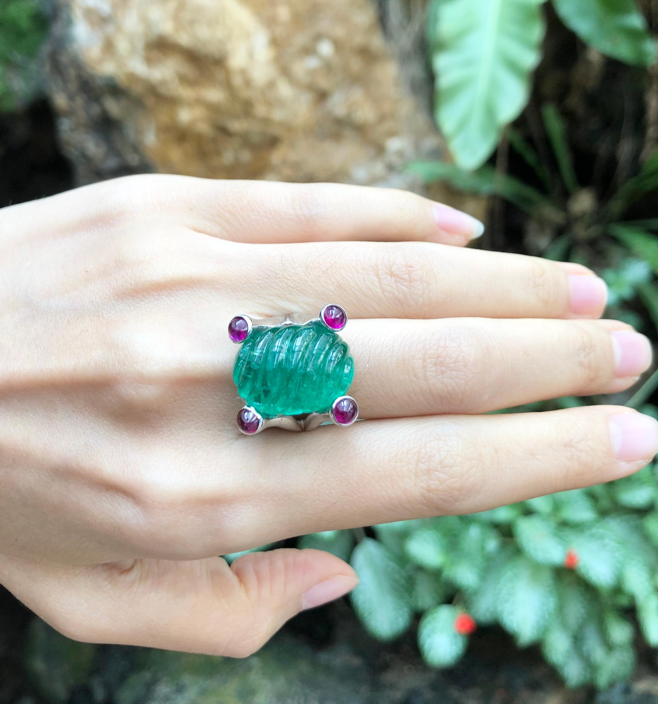 Cabochon Emerald 18.31 carats with Cabochon Ruby 1.66 carats Ring set in 18 Karat White Gold Settings

Width:  1.9 cm 
Length: 1.9 cm
Ring Size: 52
Total Weight: 11.96 grams


