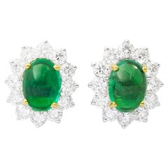 Orecchini con smeraldo cabochon e diamanti in oro giallo/bianco 18K