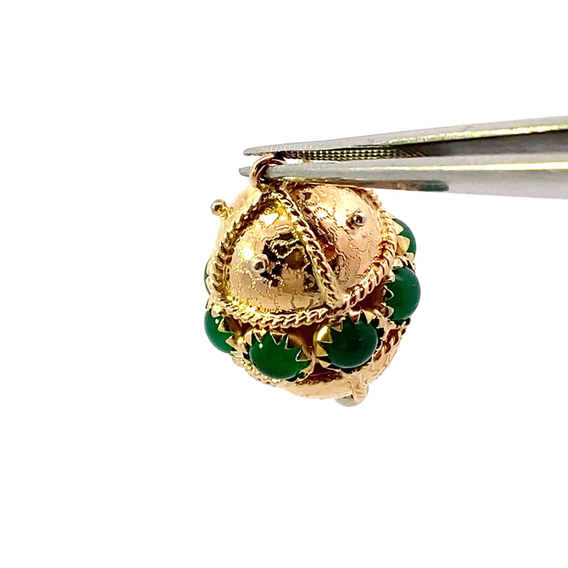18k yellow gold 8=4.0 carat total weight cabochon emerald egg-shaped charm pendant. Charm measures 30x20mm. 4.4Dwt.