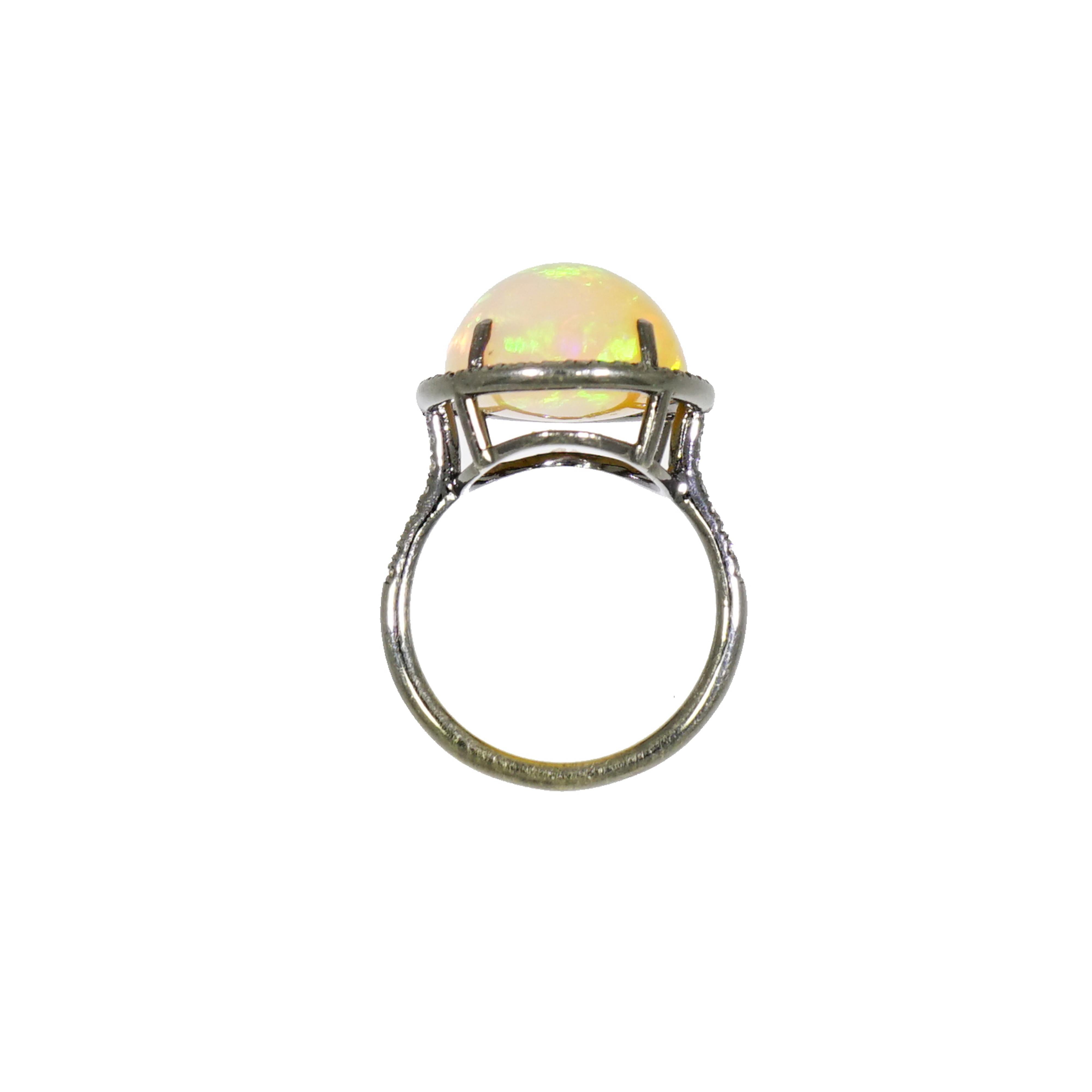 Opal is the unsung hero of the semi-precious gemstone group. Lauren K designed this ring with a sheen and airiness, rhodium plated in black to add contrast and make statement... definitely trending at the moment.
Crafted in NYC with 18k white gold