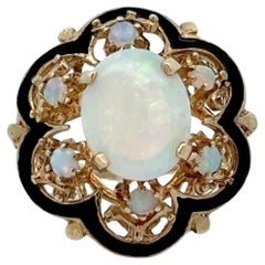 Anillo vintage de ópalo ovalado cabujón en oro amarillo de 14 quilates