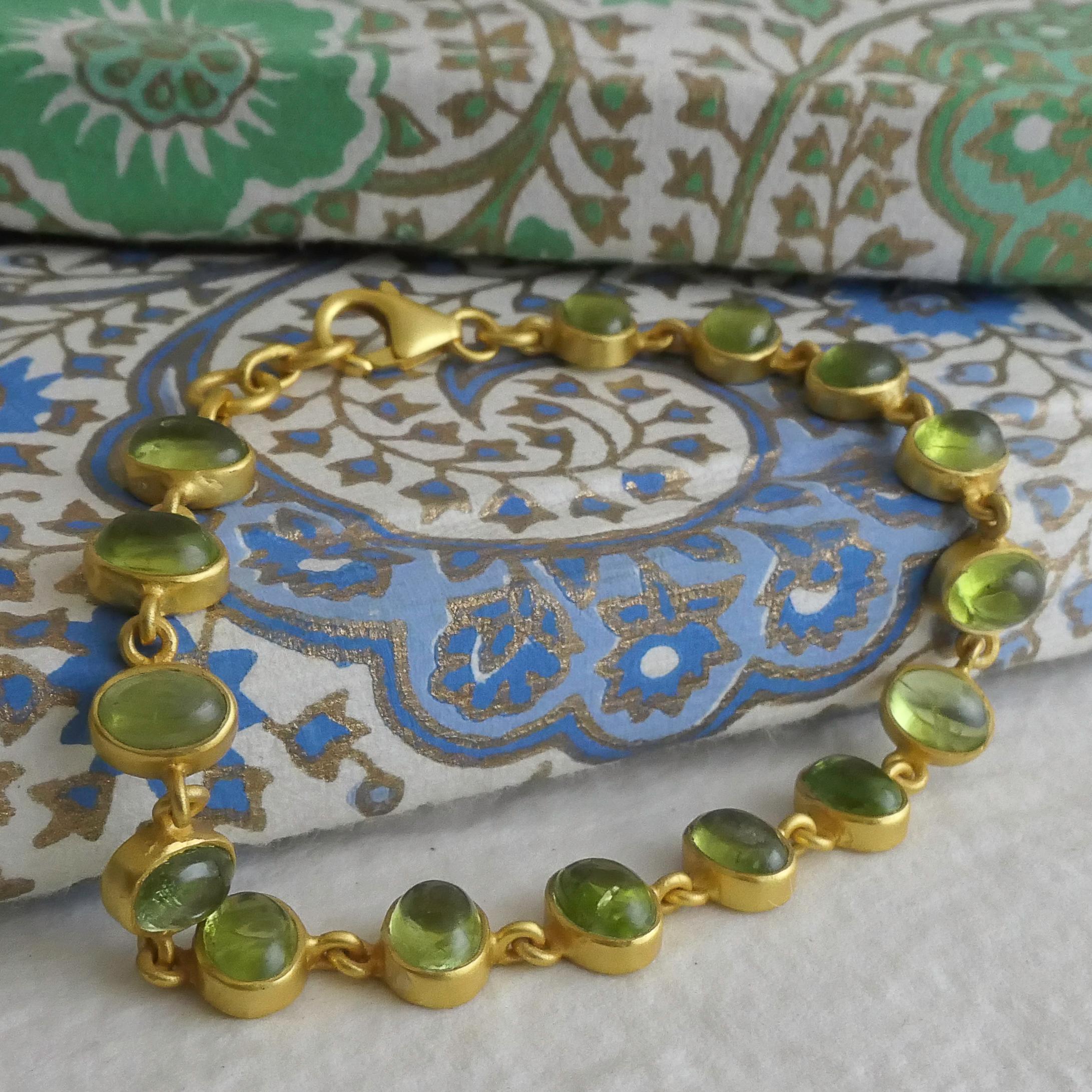 Pulsera de plata de ley chapada en oro con cabujón de peridoto en Nuevo estado para la venta en Oslo, 03