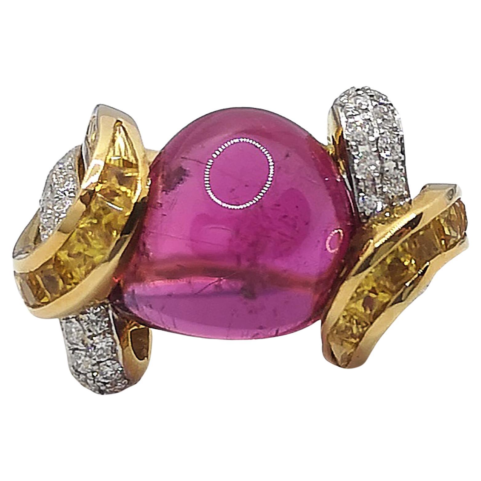 Cabochon Pink Tourmaline 11.94 carats with Diamond 0.69 carat and Yellow Sapphire 5.29 carats Ring set in 18 Karat Gold Settings

Width:  2.3 cm 
Length: 1.5 cm
Ring Size: 54
Total Weight: 12.1 grams

