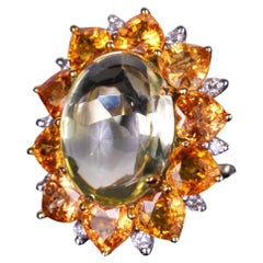 Anillo de Cuarzo Cabujón con Halo de Zafiro y Diamantes