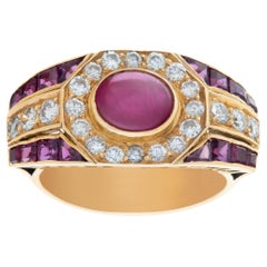 Cabochon ruby and diamond ring in 18k yellow gold. 0.50 carats in diamonds