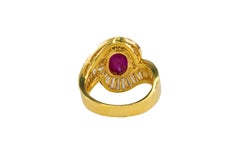 Cabochon Ruby and Tapered Baguette Diamond Ballerina Bypass Ring