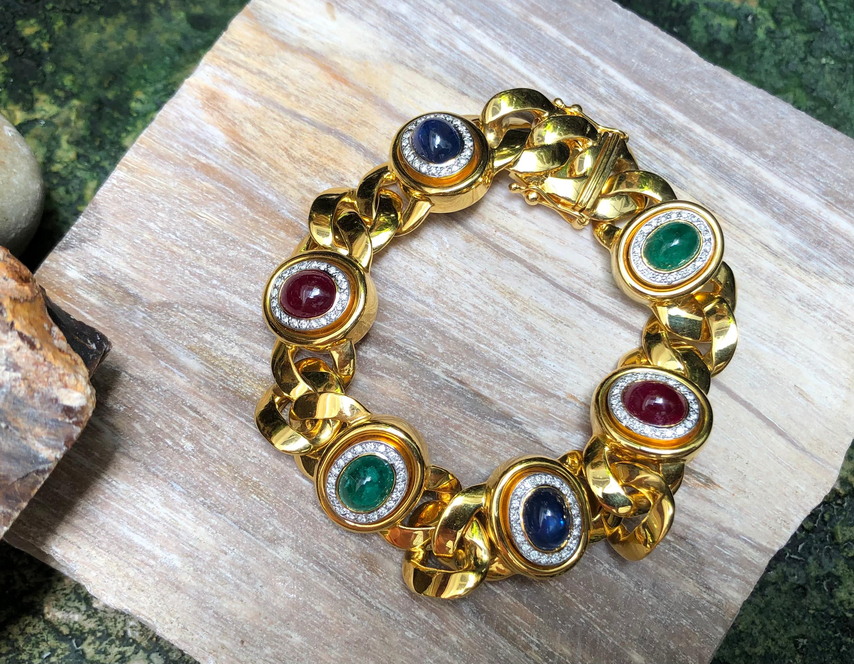Cabochon Ruby 6.0 carats, Cabochon Blue Sapphire 5.77 carats, Cabochon Emerald 4.17 carats with Diamond 0.90 carat Bracelet set in 18 Karat Gold Settings

Width:  1.8 cm 
Length: 10.3 cm
Total Weight: 105.82 grams


