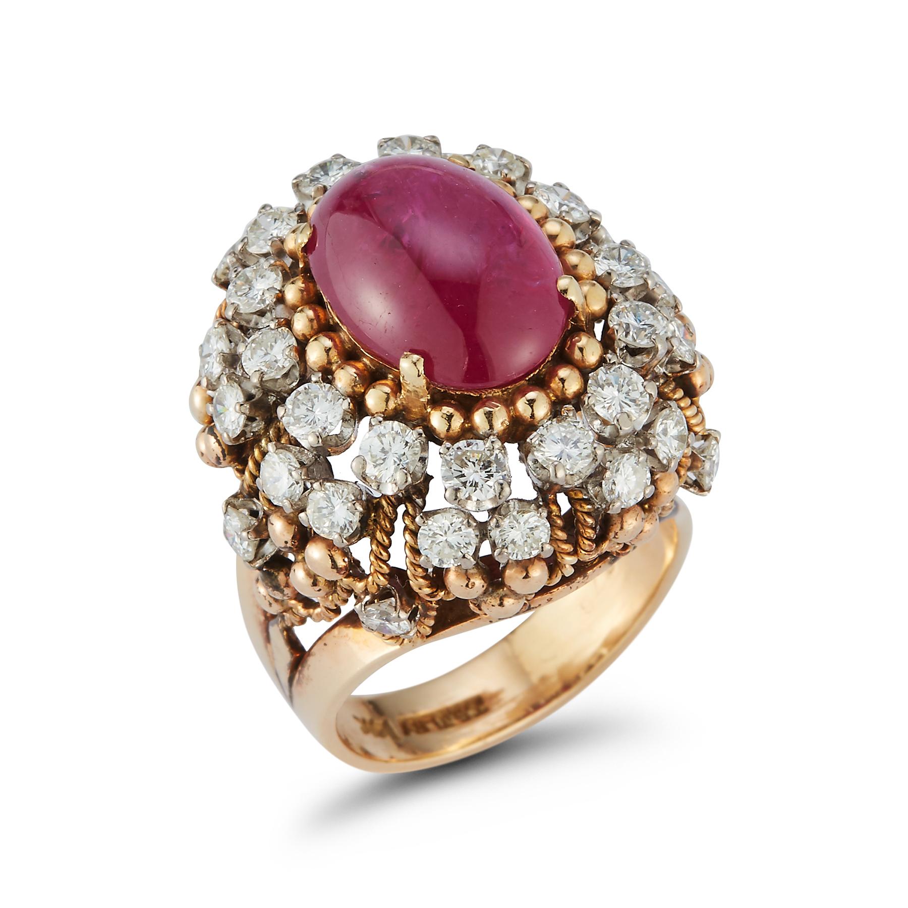 Cabochon Ruby & Diamond Cocktail Ring 1 cabochon ruby surrounded by  36 round diamonds in gold wire work

unknown maker's serial number in the shank

Ring Size: 7 

Re sizable free of charge 

Gold Type: 14K Yellow Gold 