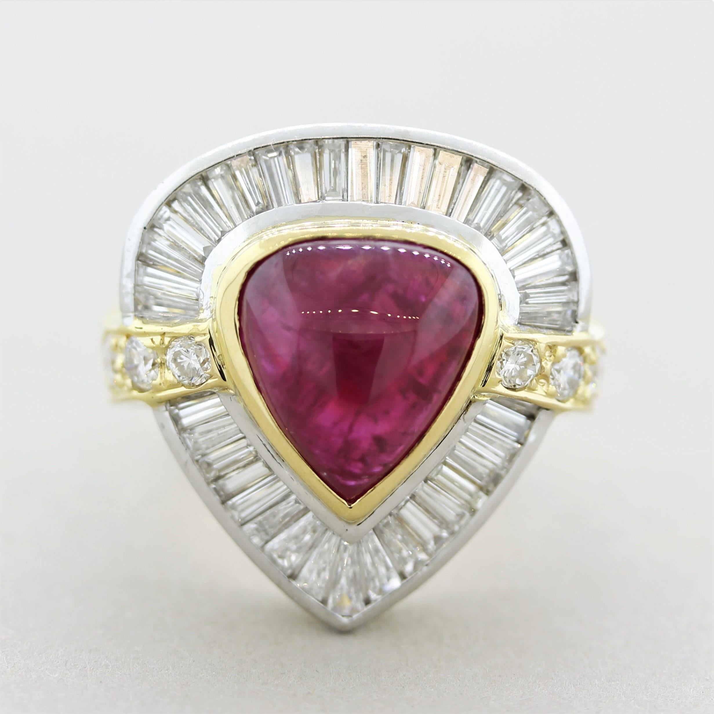 Taking center stage is a glowing 6.08 carat cabochon ruby with a vivid red color. It appears to be glowing as light moves across the stone. Surrounding the ruby are 2.19 carats of baguette-cut diamonds as well as round brilliant-cuts running down