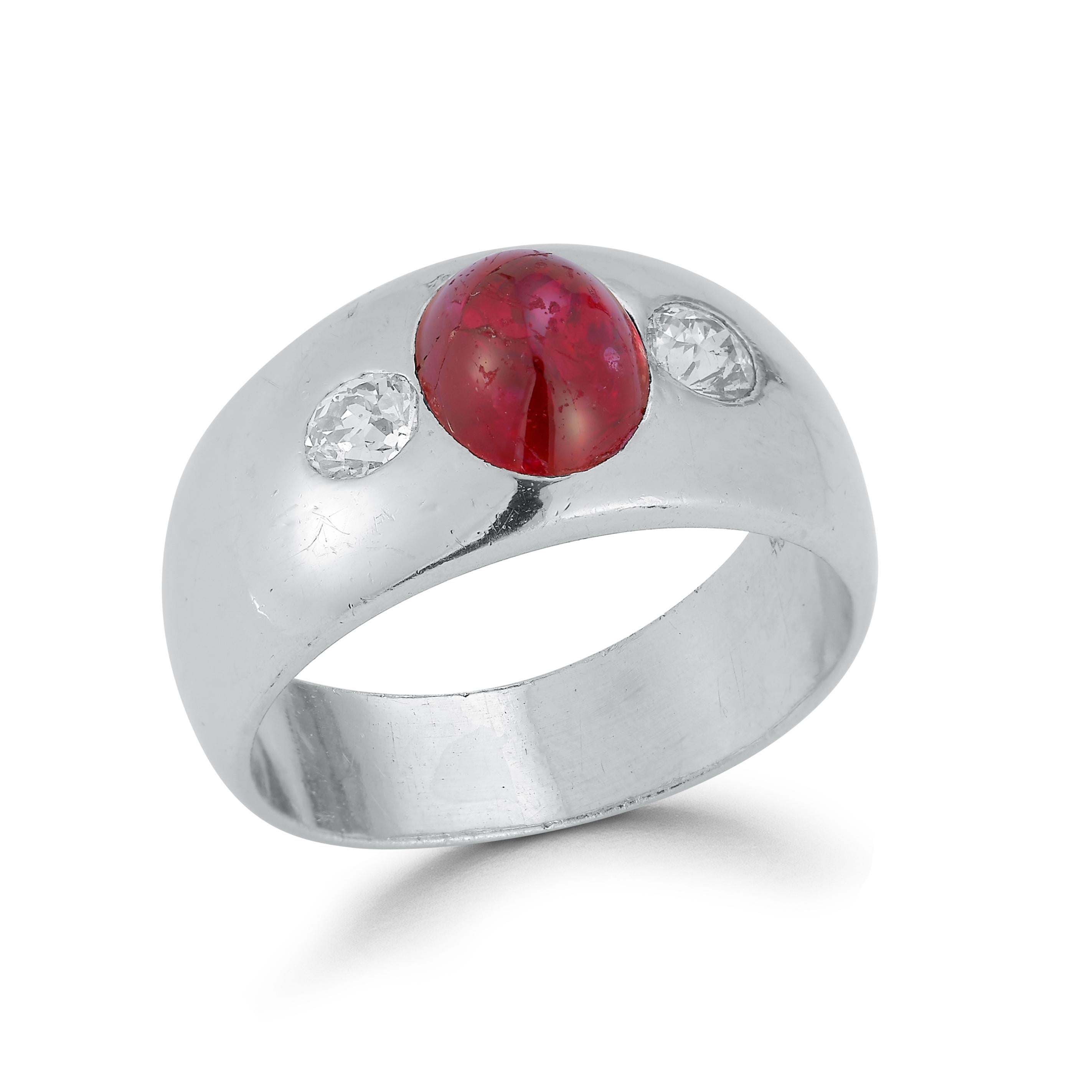 Cabochon Ruby & Diamond Mens  Ring 

1 cabochon center ruby along side 2 round cut diamonds set in platinum.

Diamonds total approximate weight: 0.45ct

Ring Size: 7.5

Re sizable free of charge 