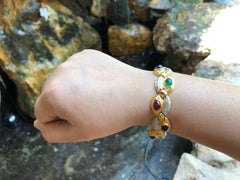 Cabochon Ruby, Emerald, Blue Sapphire with Diamond Bracelet in 18 Karat Gold