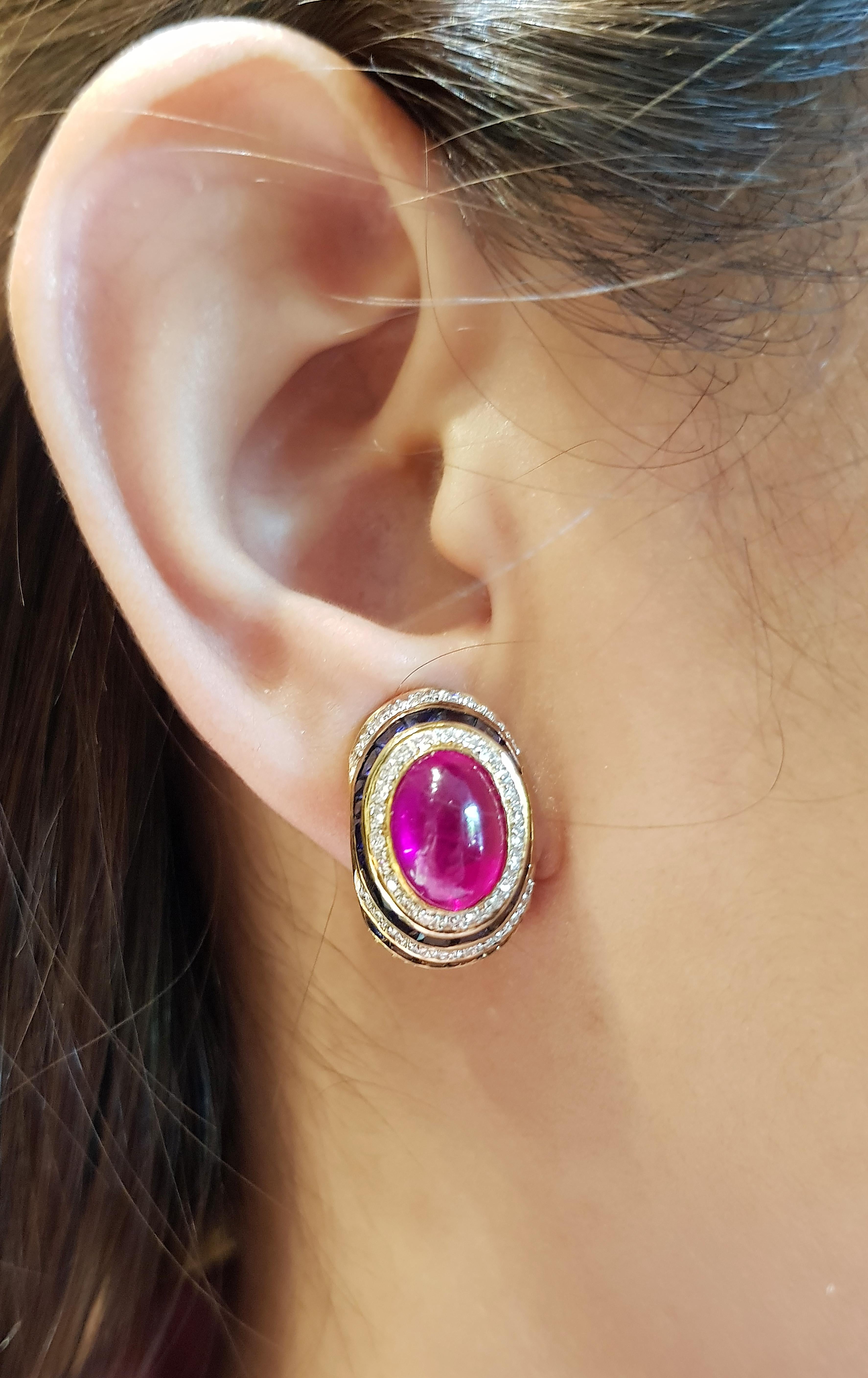 Cabochon Ruby 10.48 carats with Blue Sapphire 6.02 carats and Diamond 1.21 carats Earrings set in 18 Karat Gold Settings

Width:  1.2 cm 
Length: 2.0 cm
Total Weight: 15.47 grams

Cabochon Ruby 
Width:  0.8 cm 
Length: 1.0 cm

