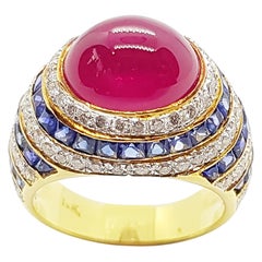 Anillo de Rubí Cabujón con Zafiro Azul y Diamantes engastado en Oro de 18 Kilates