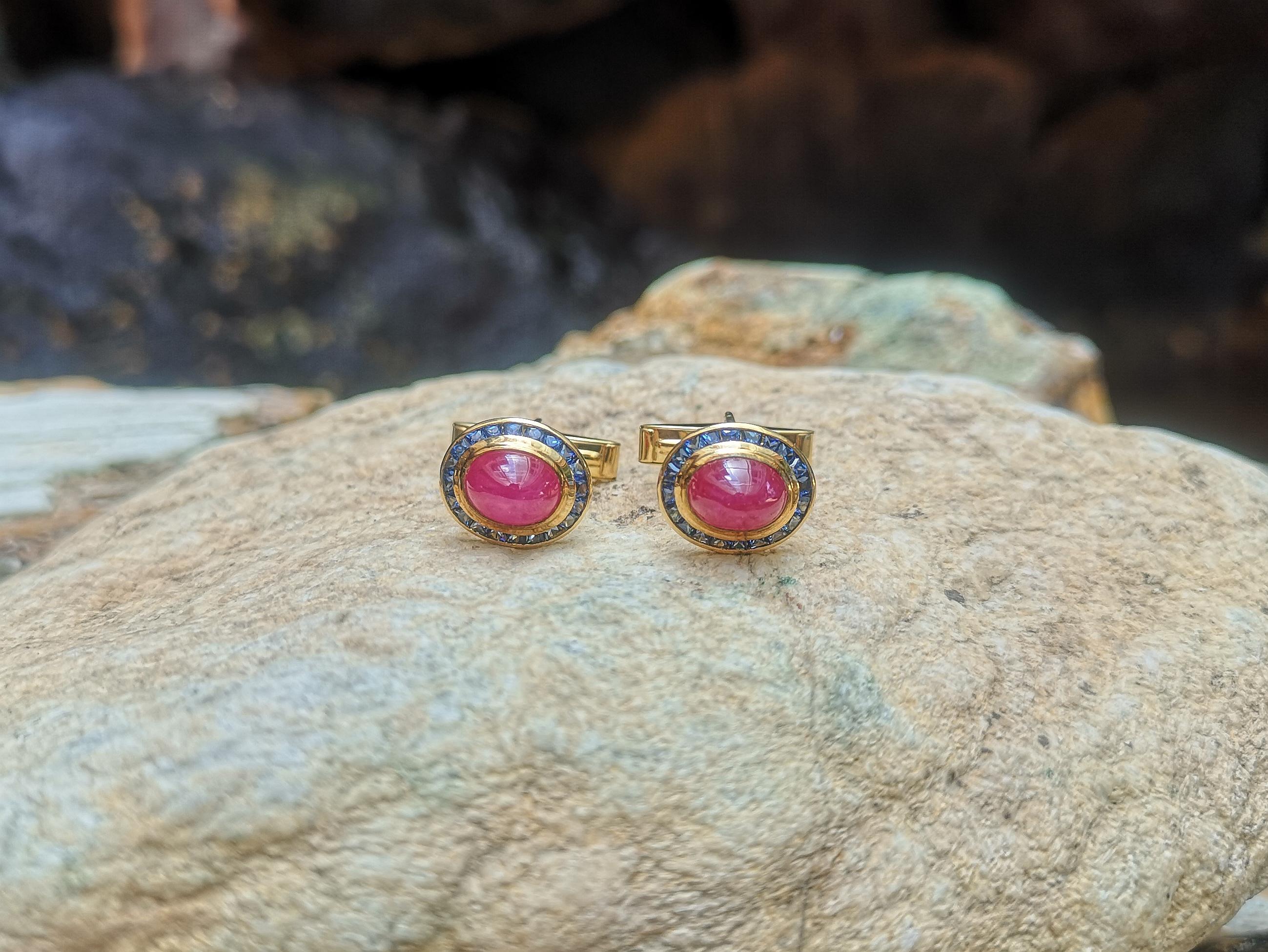 Cabochon Ruby 6.67 carats with Blue Sapphire 1.84 carats Cufflinks set in 18 Karat Gold Settings

Width:  1.5 cm 
Length: 1.0 cm
Total Weight: 8.08 grams

