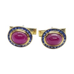 Used Cabochon Ruby with Blue Sapphire Cufflinks Set in 18 Karat Gold Settings