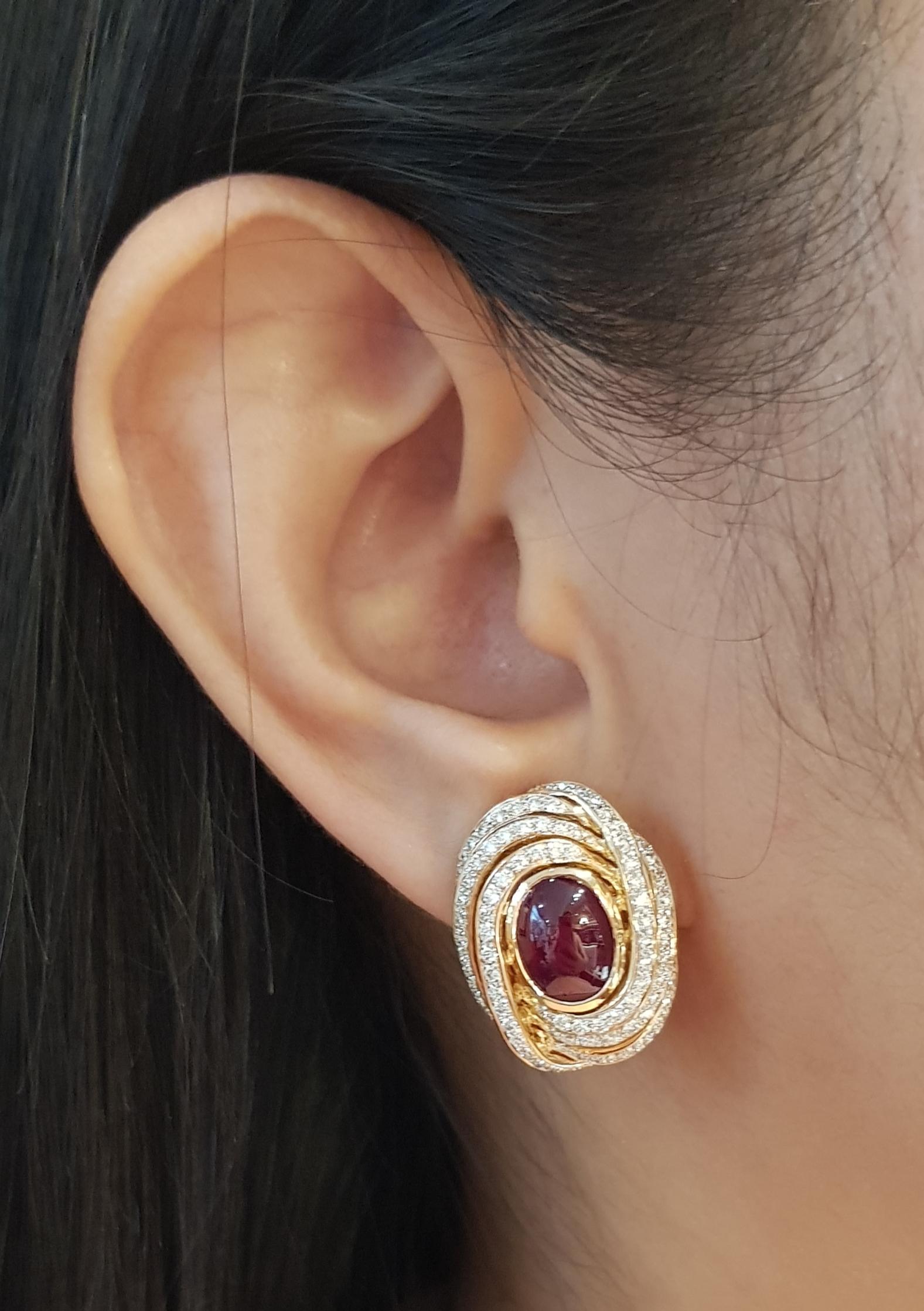 Cabochon Ruby 3.56 carats with Diamond 1.47 carats Earrings set in 18K Rose Gold Settings

Width: 1.7 cm 
Length: 2.4 cm
Total Weight: 15.94 grams


