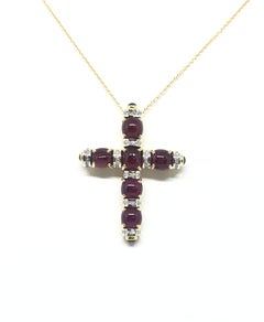 Cabochon Ruby with Diamond Pendant set in 18 Karat Gold Settings