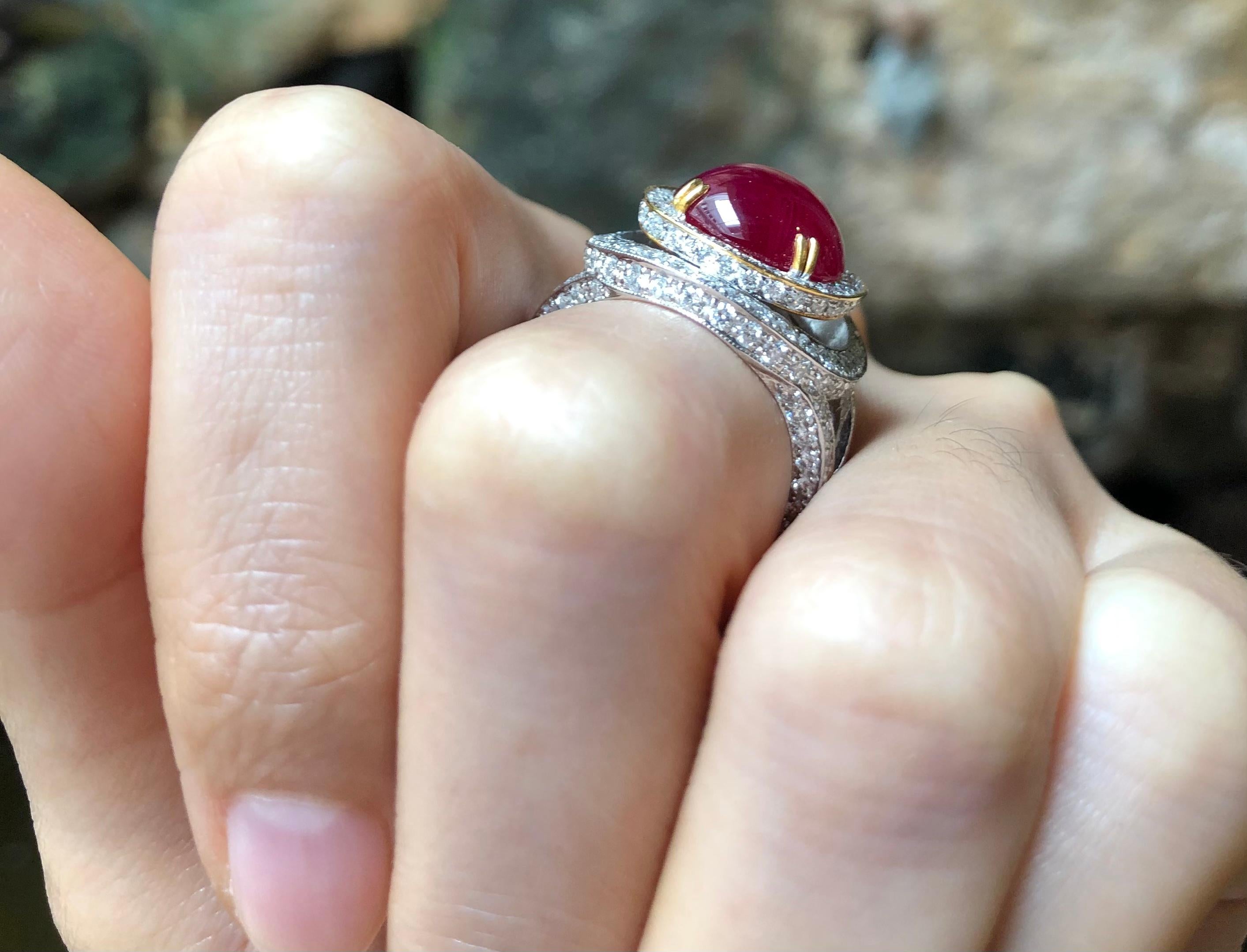 Cabochon Ruby 7.76 carats with Diamond 2.17 carats Ring set in 18 Karat White Gold Settings

Width:  1.5 cm 
Length:  2.0 cm
Ring Size: 53
Total Weight: 13.78 grams

