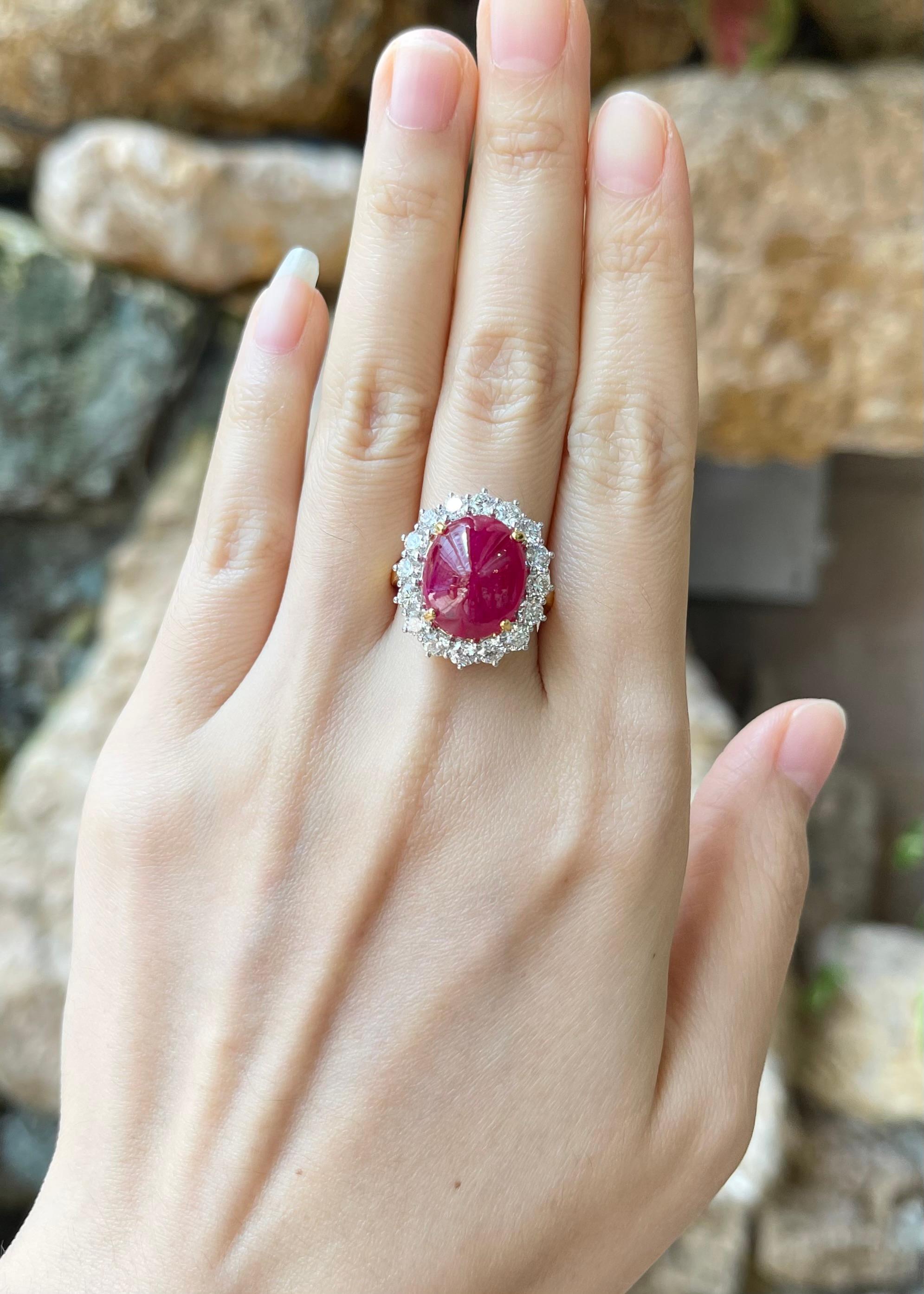 Cabochon Ruby 10.32 carats with Diamond 1.92 carats Ring set in 18K Gold Settings

Width:  1.9 cm 
Length: 2.3 cm
Ring Size: 54
Total Weight: 12.66 grams

