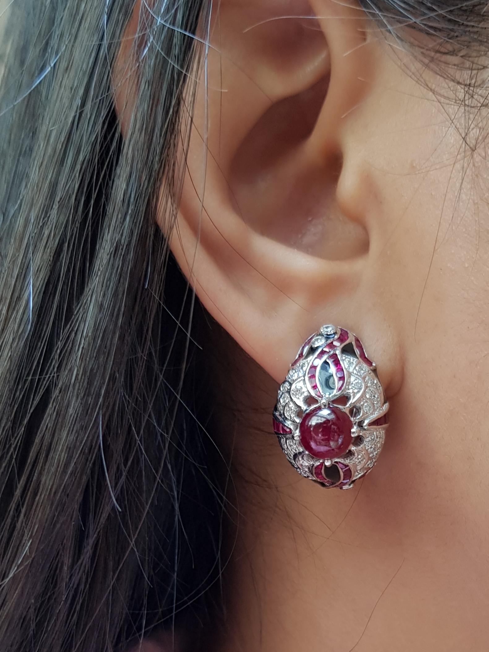 Cabochon Ruby 4.05 carat with Ruby 7.14 carats and Diamond 1.04 carats Earrings set in 18 Karat White Gold Settings

Width: 2.2 cm
Length: 2.5 cm 

