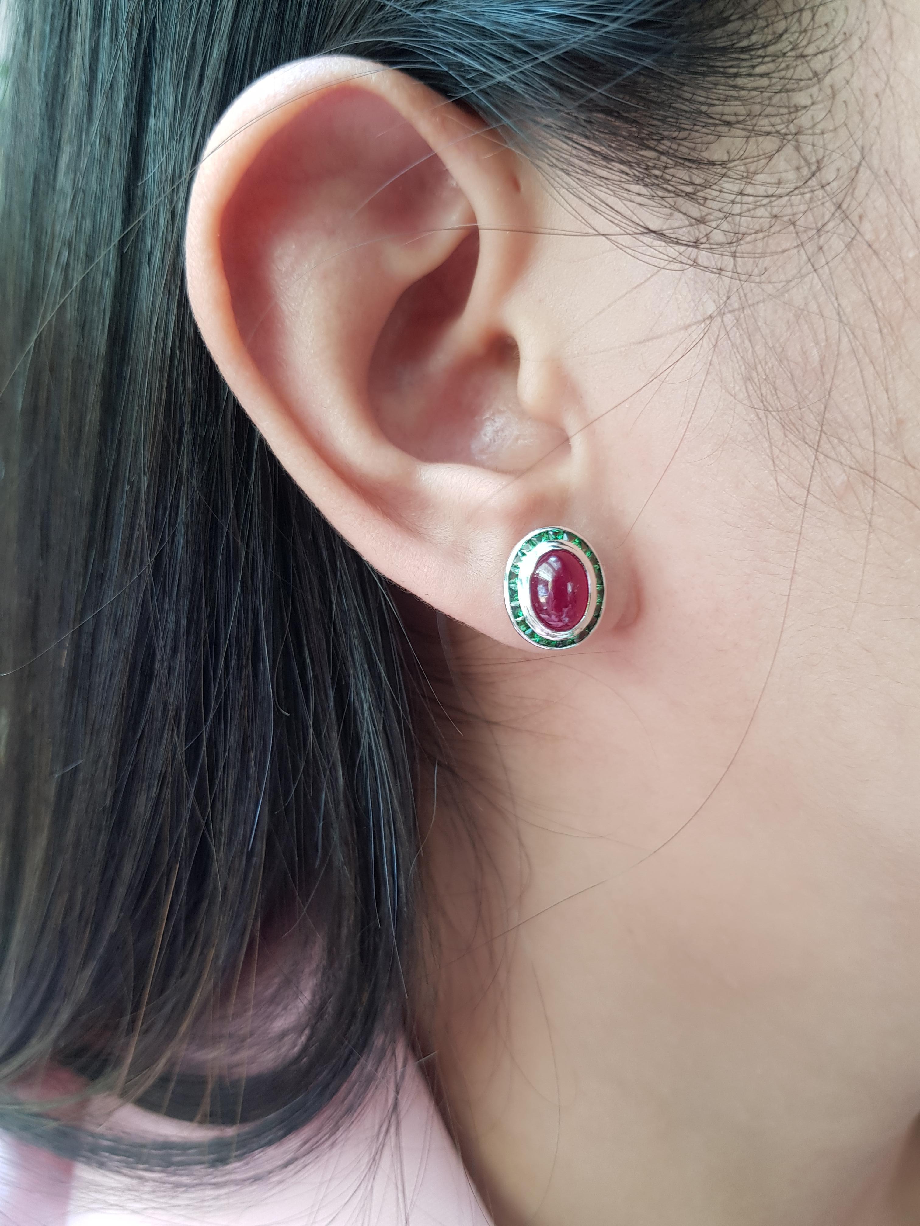 Cabochon Ruby 3.77 carats with Tsavorite 1.49 carats Earrings set in 18 Karat White Gold Settings

Width: 1.0 cm
Length: 1.3 cm 

