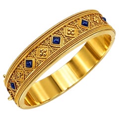 Cabochon Sapphire and 15K Yellow Gold Etruscan Bangle Bracelets