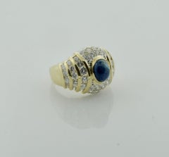 Cabochon Sapphire and Diamond Fashion Ring in 18 Karat Yellow Gold circa 1970s