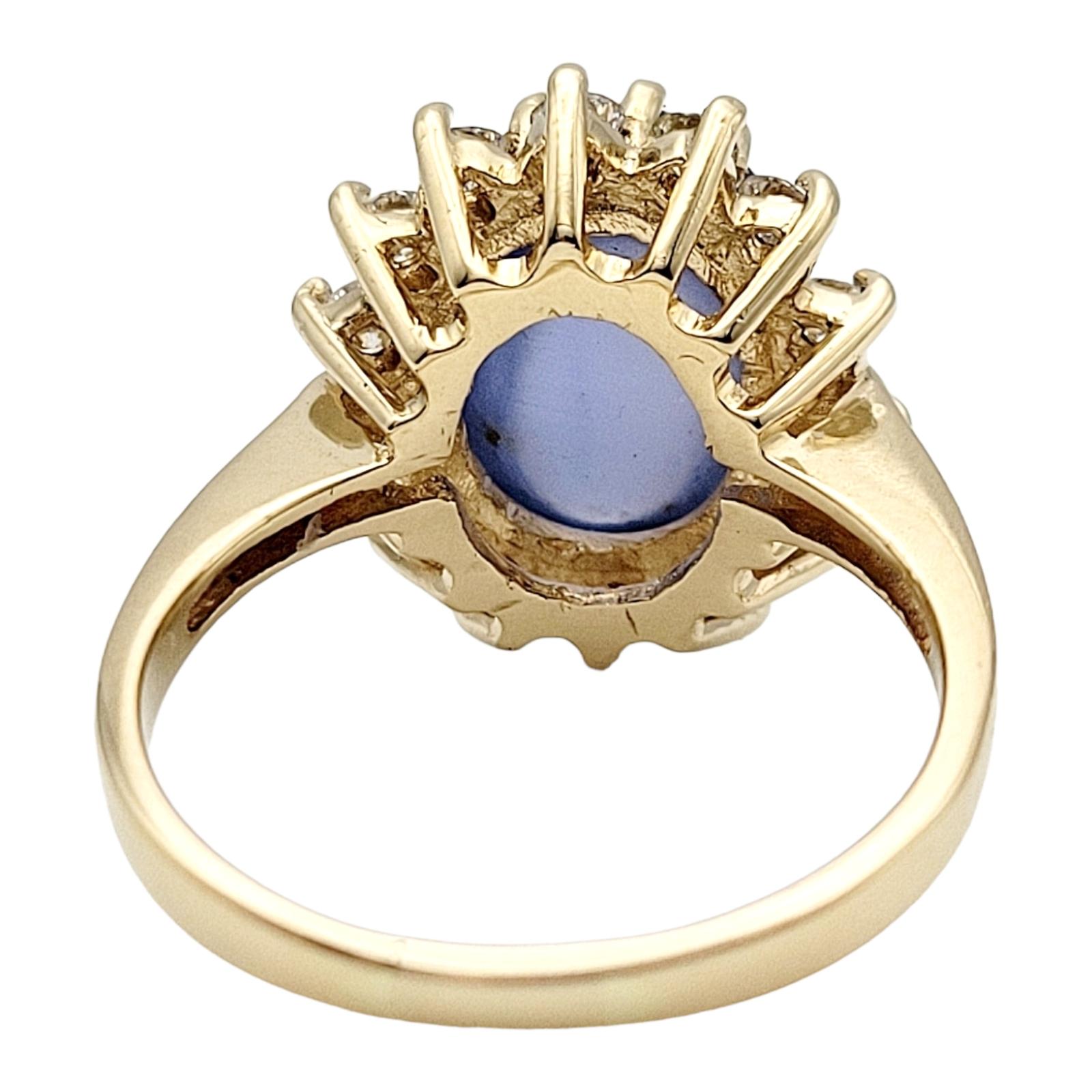 Contemporary Cabochon Sapphire and Diamond Halo Cocktail Ring in 14 Karat Yellow Gold For Sale