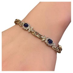 Cabochon Saphir und Diamant A Link Armband aus 18k Gelbgold