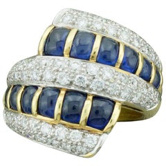 Retro Cabochon Sapphire and Diamond Ring in 18 Karat Yellow Gold