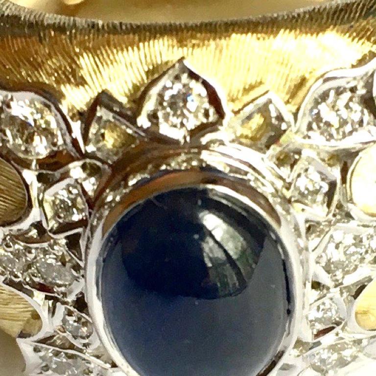 Gorgeous oval cabochon 1.5 carat sapphire ring, set in 18 carat white gold in lace design detail with brilliant diamonds on an 18 carat yellow gold engraved bombé ring. Please note this item is made to order and a similar but not identical piece can