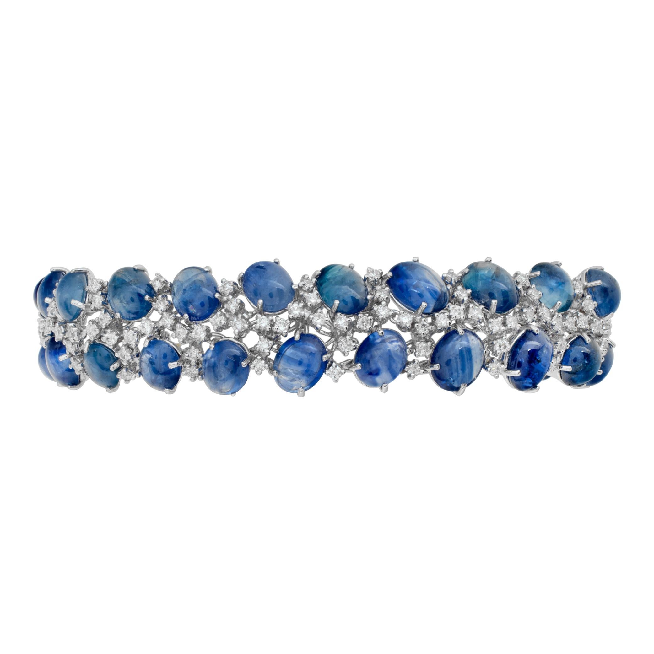 Cabochon Sapphire & diamond line bracelet in 18k white gold. Cabochon sapphire total approx. weigth: 50.00 carats. Round brilliant cut diamonds total approx. weight: 2.72 carats, all white and eye clean.  Length 7 inches, width 0.6 inch.