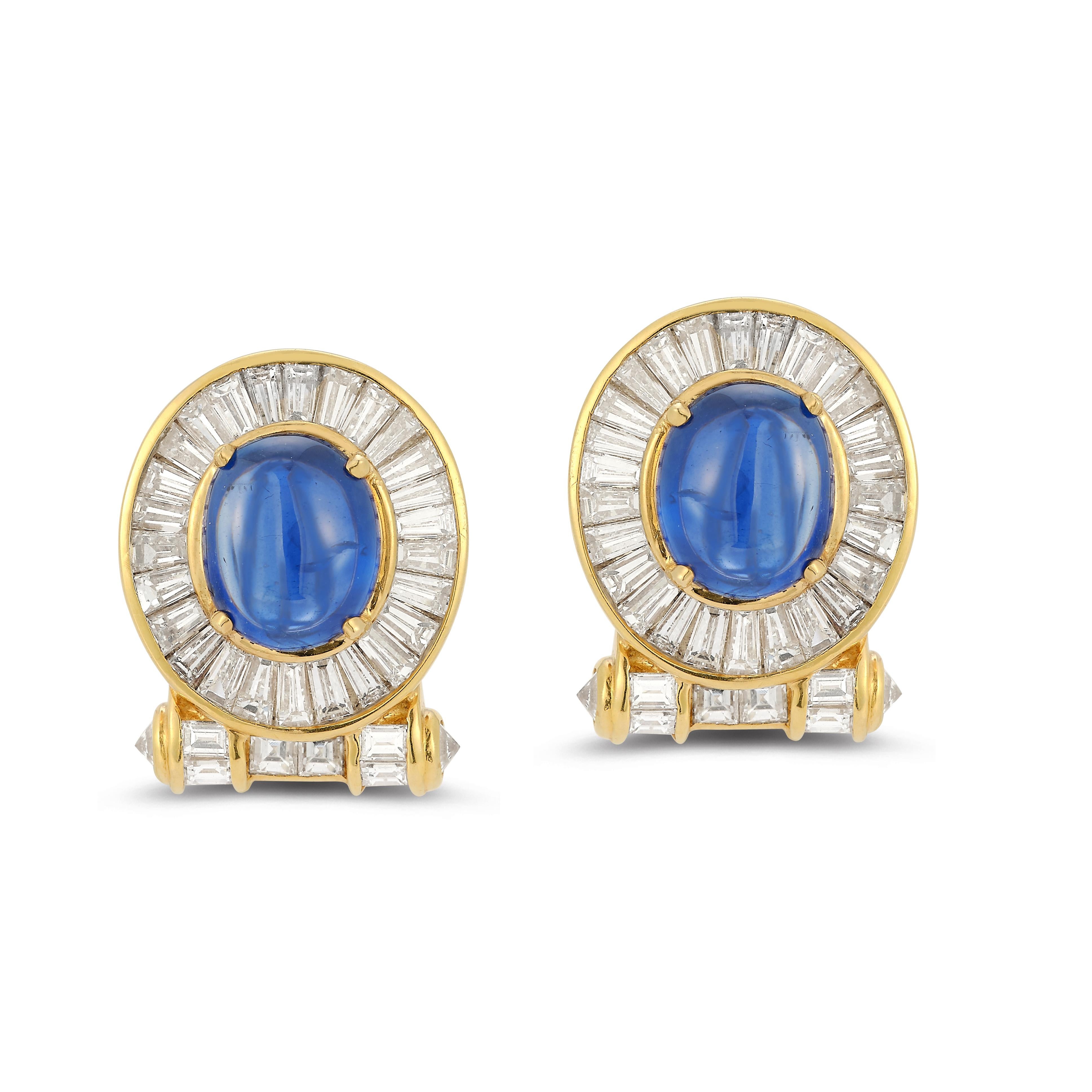 Cabochon Sapphire & Diamond Earrings

Cabochon sapphires surrounded by baguette & round cut diamonds set in 18k yellow gold.

Sapphire Weight: approximately 6.01 cts 

Round Cut Diamond Weight: approximately .24 cts 
Baguette Cut Diamond Weight: