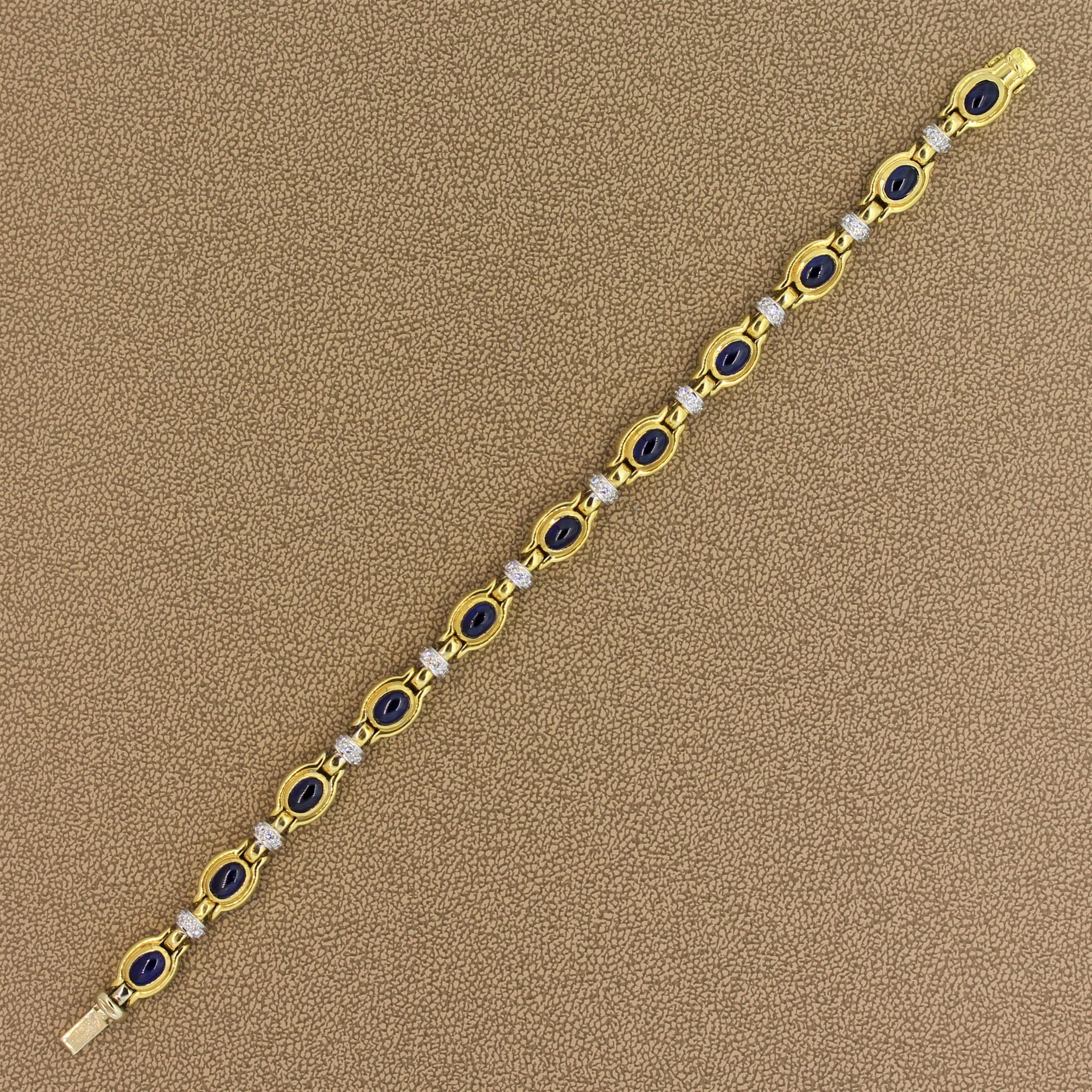 A timeless bracelet featuring 8.51 carats of vivid blue sapphires. The cabochon sapphires are bezel set in an 18K yellow gold setting with 0.53 carats of round cut diamonds between each link in an 18K white gold. A seamless box clasp with a hidden