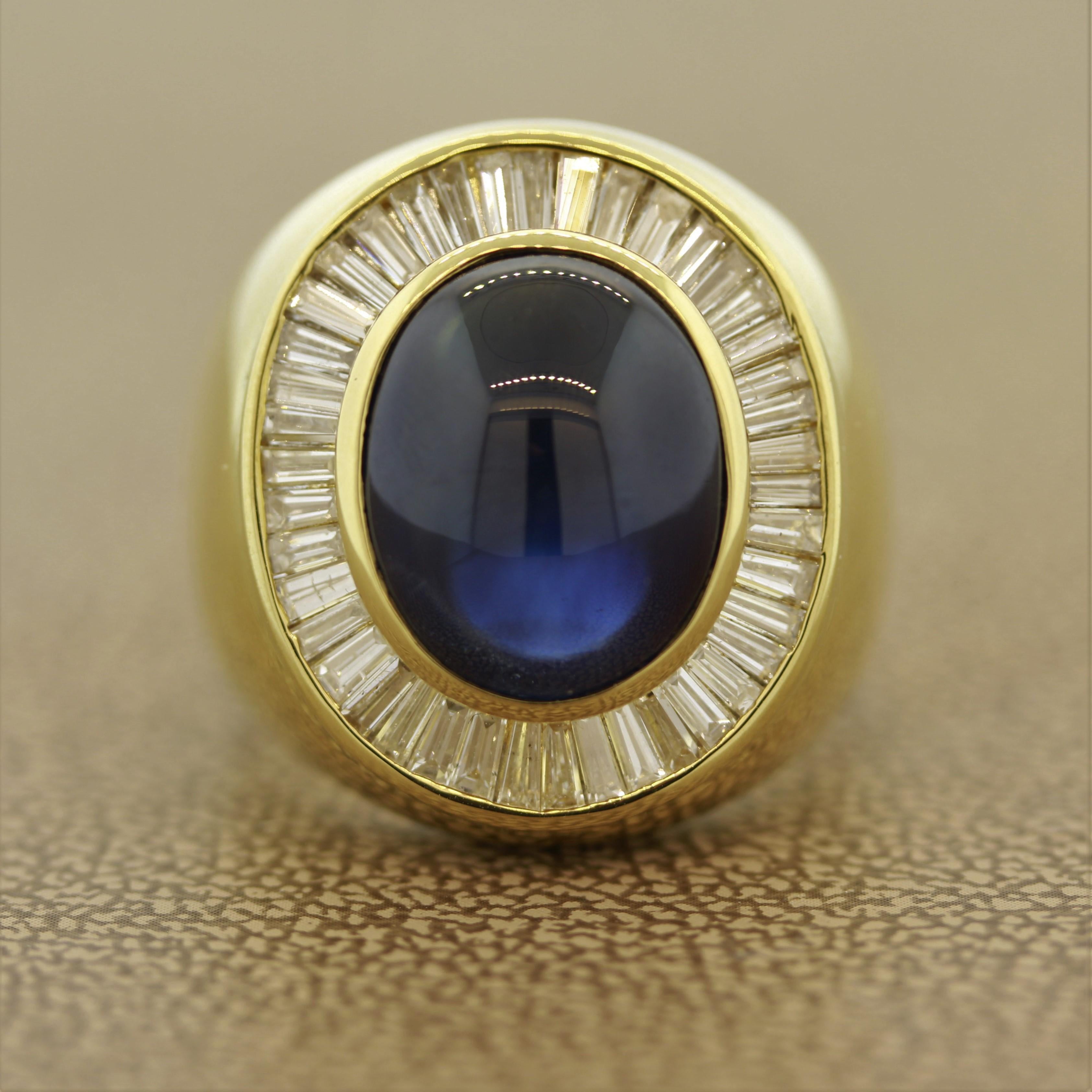 A superb ring featuring a 12 carat cabochon blue sapphire. It has a deep rich blue color and is free of any eye visible inclusions. It is complemented by 2.50 carats of baguette cut diamonds set around the sapphire. Hand fabricated in 18k yellow