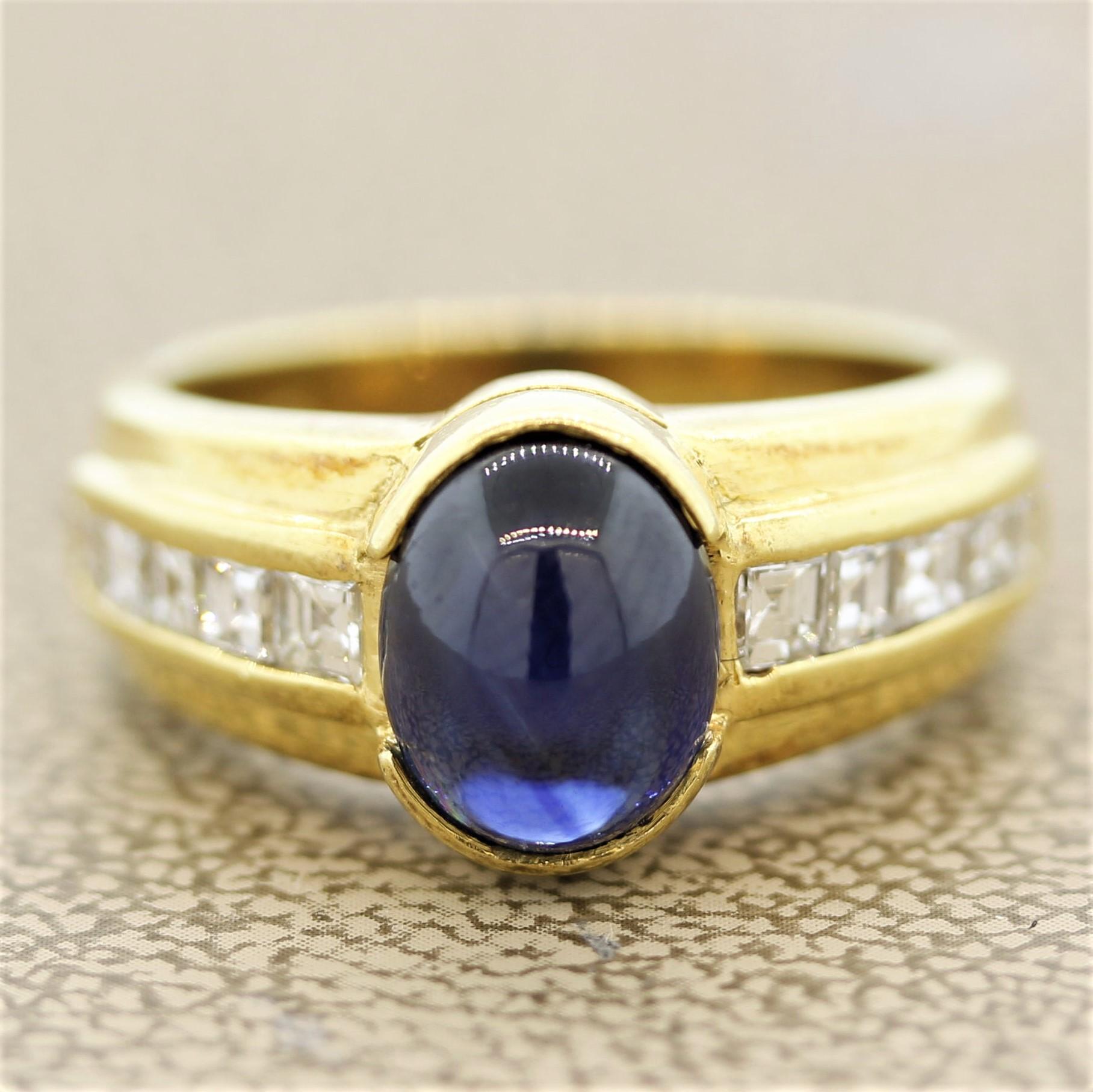 A lovely ring featuring a 3.07 carat cabochon sapphire with a vivid blue color. It is accented by 0.63 carats of fine asscher cut diamonds which are channel set on the sides of the ring. Made in 18k yellow gold, this gemstone ring will make a great