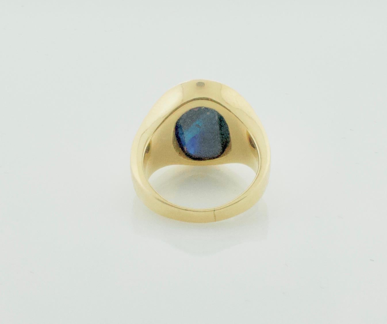 Modern Cabochon Sapphire Pinky Ring with Bark Finish in Yellow Gold For Sale