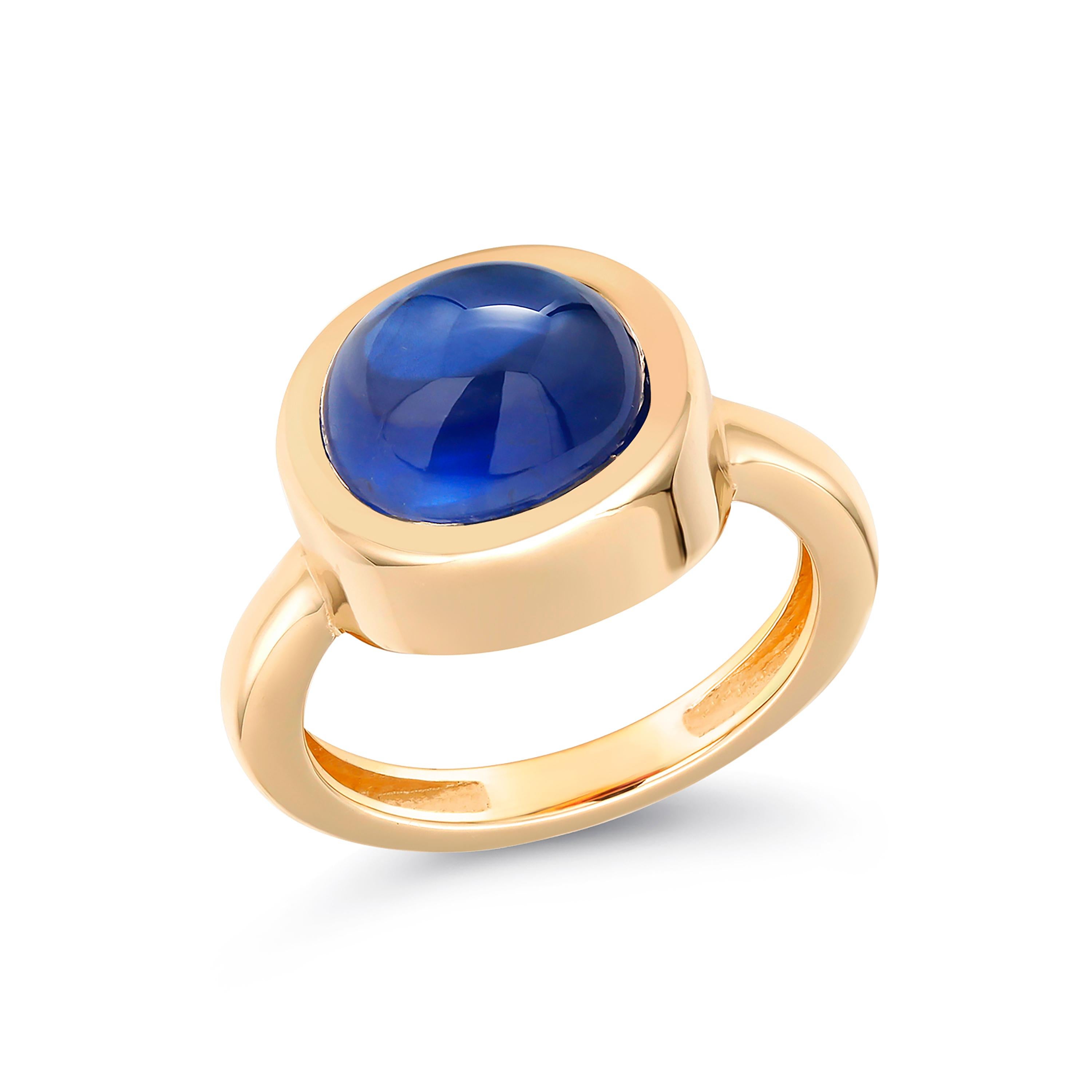 Eighteen karats yellow gold raised bezel dome cocktail ring
Oval-shaped cabochon sapphire weighing 4.40 carats                                                        
Ring size 6 In Stock
The ring can be resized 
Ring Shank measuring 2.75 millimeter