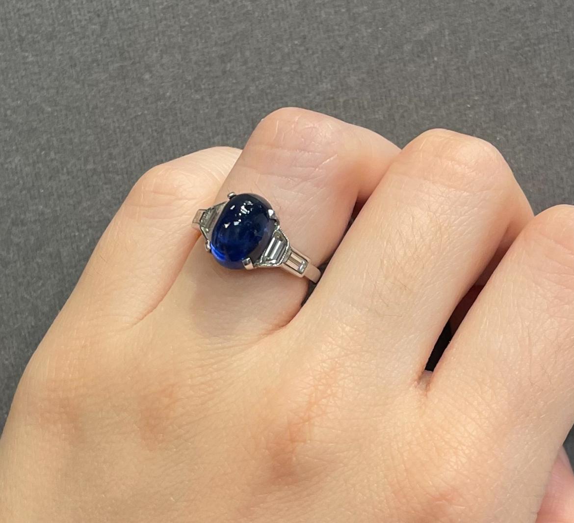 Cabochon Sapphire Ring

A platinum ring set with a cabochon sapphire adorned with four baguette cut diamonds. 

Accompanied by AGL stating sapphire is of Thai origin

Approximate Sapphire Weight: 15.5 carats
Ring Size: 6 
Complimentary resizing