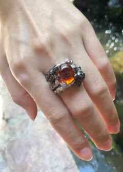 Cabochon Spessartite, Tsavorite and Brown Diamond Ring in 18 Karat White Gold