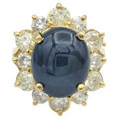 Cabochon Star Sapphire and Diamond Halo Cocktail Ring in 18 Karat Yellow Gold