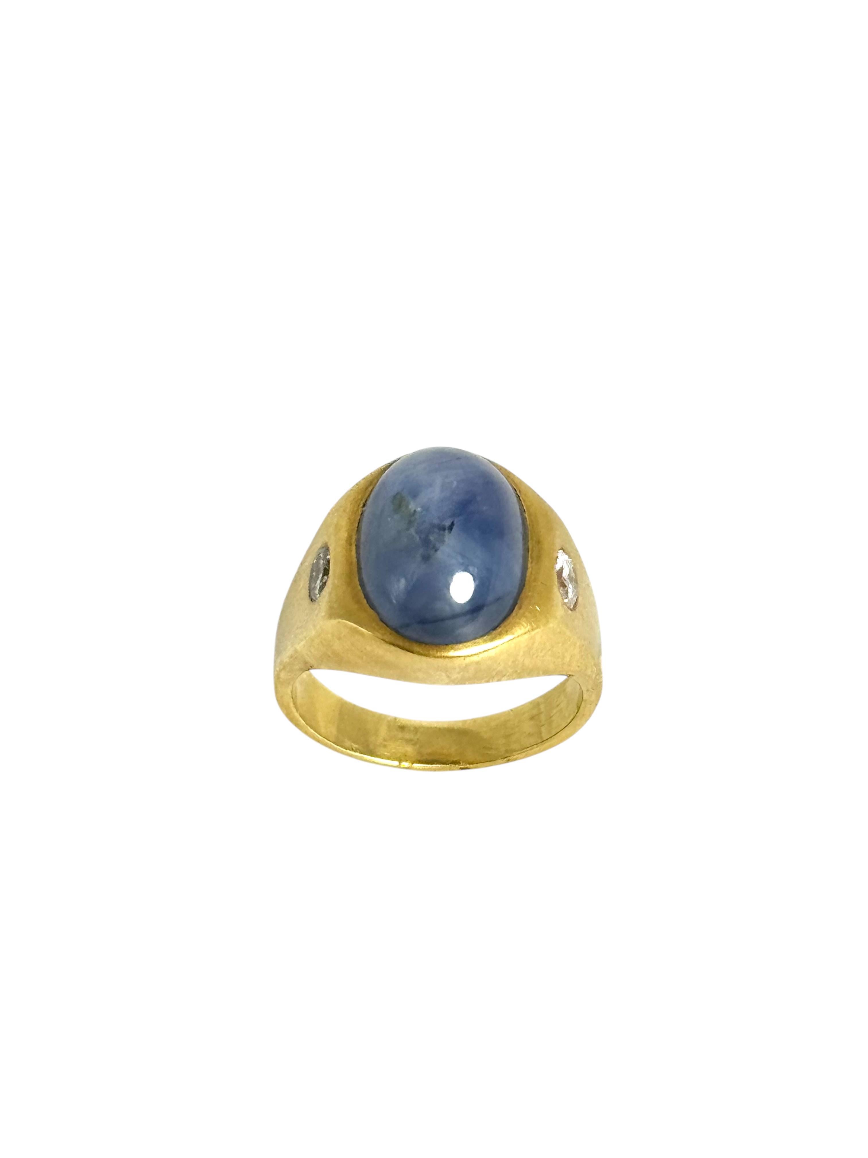 18K yellow gold ring with cabochon star sapphire 17.28 carats, 2 round diamonds .053 carats