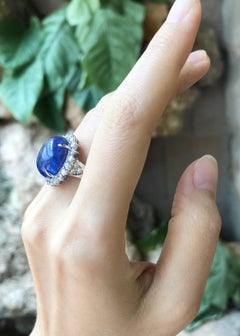 Cabochon Tanzanite with Cubic Zirconia Ring set in Silver Settings